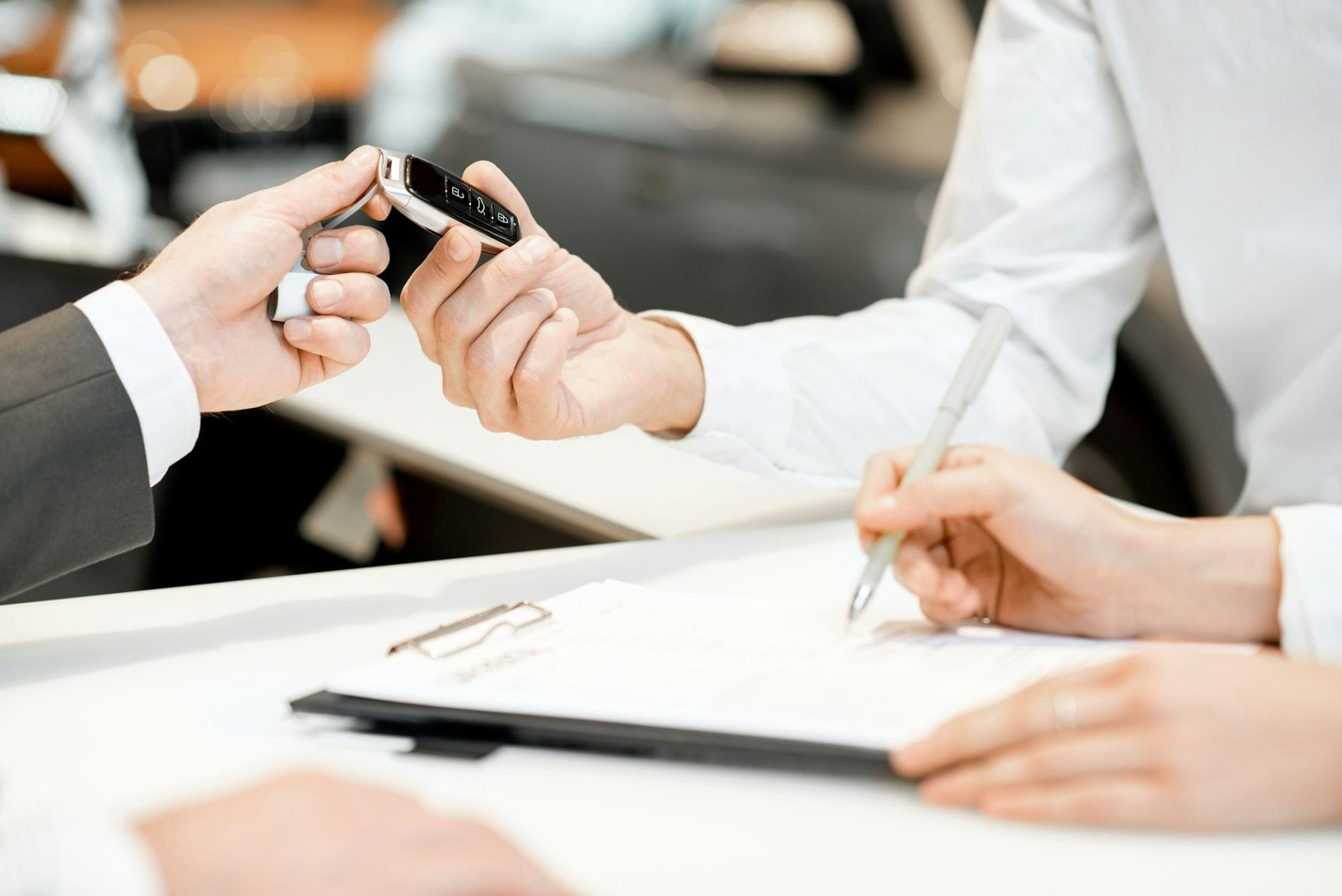 Giving car keys in the showroom